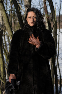 Winter Portrait Of Woman Dressed Warmly 