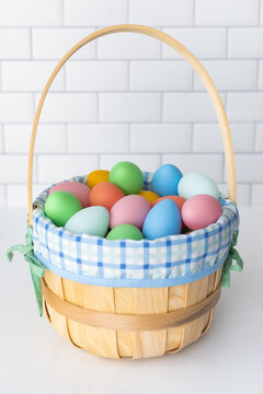 Basket of pastel Easter eggs