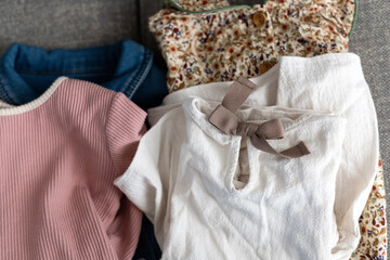 Folded laundry on bed