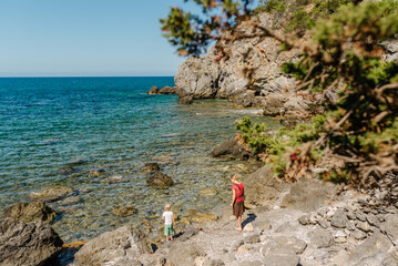 Mother and sone on a beach