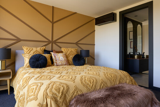 Styled bedroom with kingsize bed