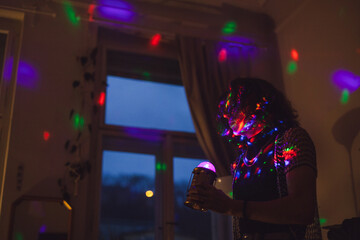 Fashionable guy in 20s preparing for a party