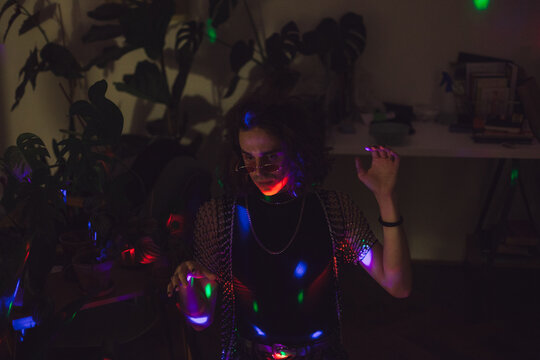 Fashionable guy in 20s preparing for a party
