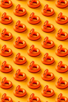 vertical pattern of Inflatable flamingo on yellow. 