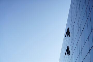 Glass building with opened windows