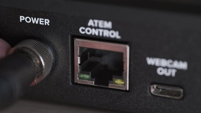 Connecting Power Cable to Video Switcher for Livestreaming with Webcam