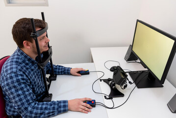 Man doing eye tracking examination