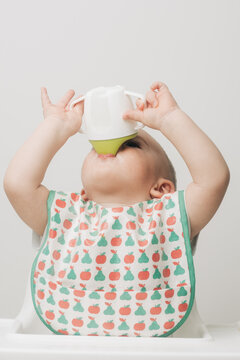 Anonymous Baby Drinking From A Sippy Cup 