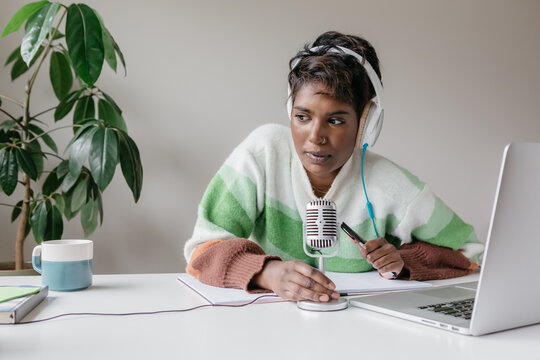 Woman talking on a podcast interview