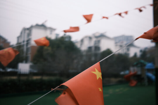 Closeup Of Chinese Flag Blowing In The Wind