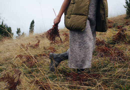 Cropped Image of Woman Walking in the Countryside