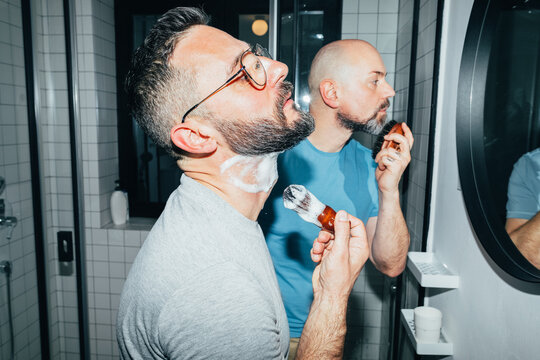 Gay Couple Shaving in Bathroom