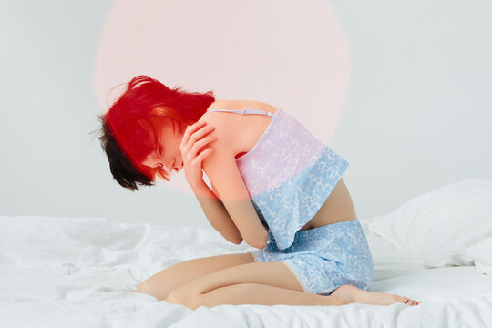 Sad woman portrait - Depressive woman sit on bed