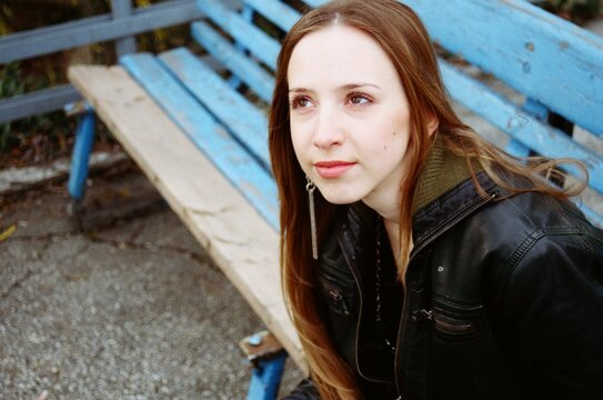 Portrait Of The Beautiful Woman In A Park