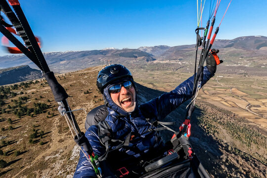 selfie of paragliding pilot