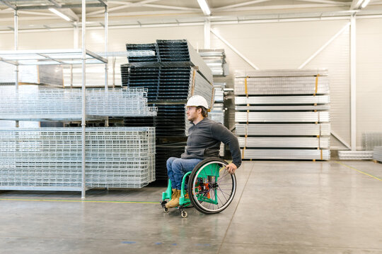 Man With A Physical Disability In A Factory