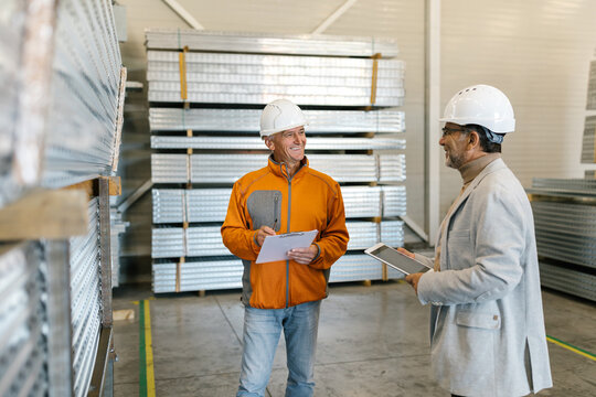 Workers In An Aluminium Warehouse