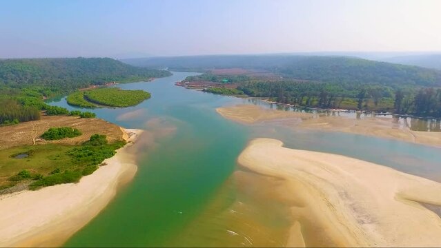 A beautiful drone shot of Aravali river in Goa, India.