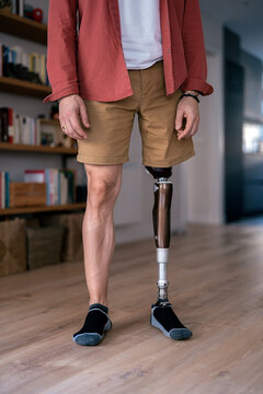 Crop person with leg prosthesis