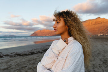 Portrait of woman looking at the ocean