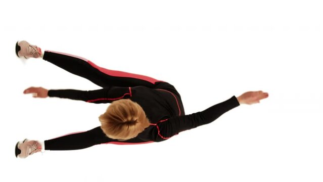 Woman Stretching before a run, White Background - Vertical shot