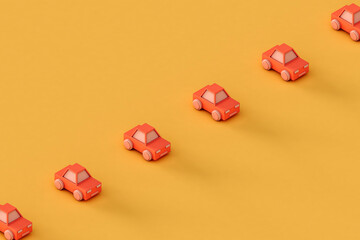 a row of Pink toy car on a yellow background