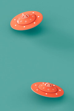 Pink UFOs or UAPs on a blue background. 