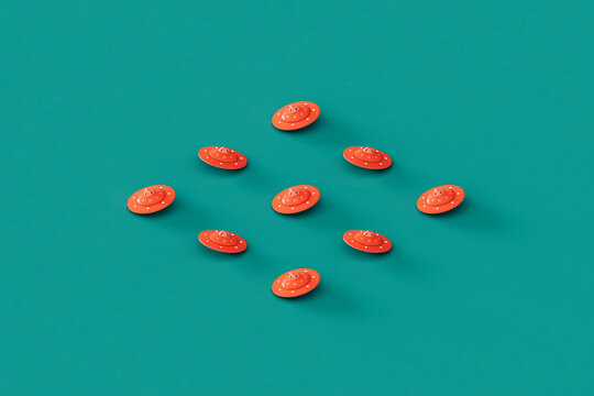 collection of Pink UFOs or UAPs on a blue background. 