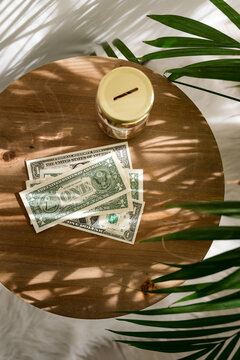 Dollar banknotes on a table