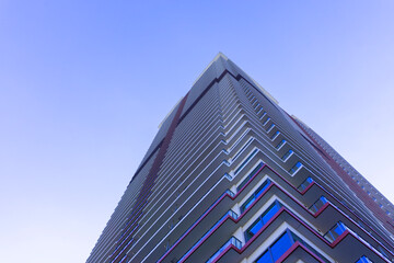 Fototapeta na wymiar Landscape photograph looking up at a high-rise apartment_c_01