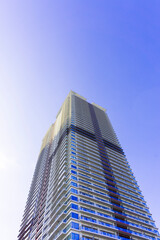 Landscape photograph looking up at a high-rise apartment_c_10