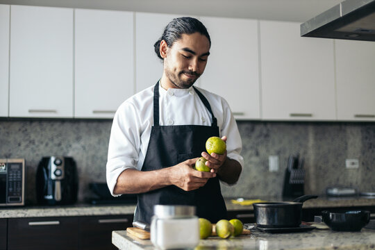 Pastry chef looking some lemons