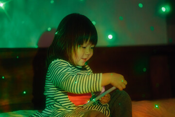 Little girl using mobile phone