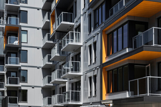 Modern design building with orange balconies 