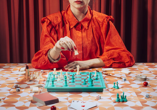 Female /Female Hands Playing Chess.