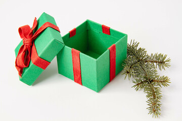 Present. Gift box with a bow. New Year's surprise. Red and green box with a gift