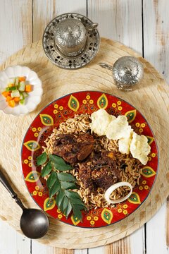 Nasi Kebuli, Spice Arabian Rice with Roasted Lamb and Acar