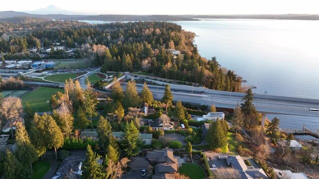 Cinematic 4K aerial drone footage of the 520 Bridge View Park, Medina, Clyde Hill, Evergreen Pt floating bridge, Lake Washington mansions, luxury homes, villas