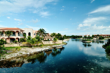 View of the resort town of Puerto Aventuras, A beautiful view of the city on the river bank. Riviera Maya, Mexico.