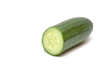 Red tomato and cucumber on a white background. For grocery stores.