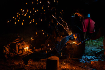 Foreign workers cut steel at construction sites with Oxy-Propane cutting.