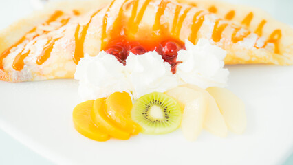 Cake decorated with fresh  on white background. Cafes in Phuket Thailand.