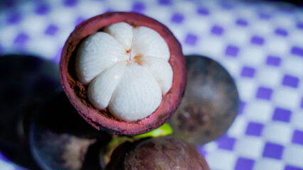 Fresh ripe mangosteen fruit from the garden with natural background Thailand