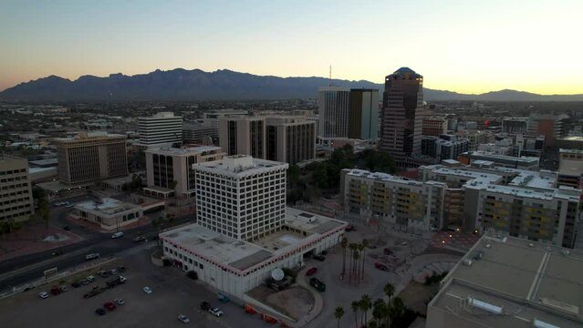 Aerial push in to Tucson Arizona Skyline at Sunrise