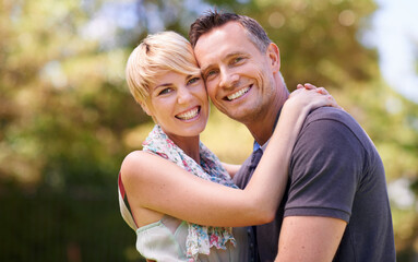 Obraz premium Nurturing our love. Shot of a mature couple embracing outdoors.