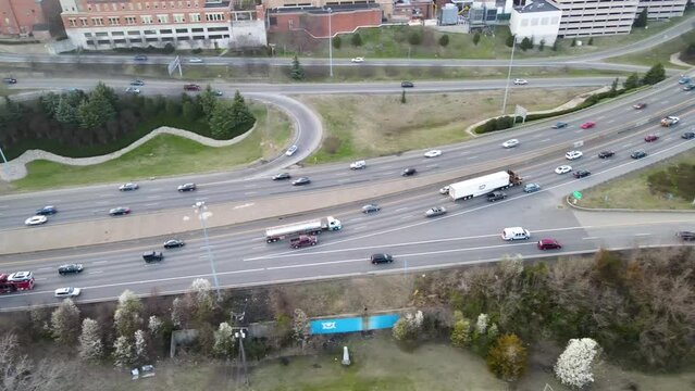 Rush Hour Traffic on Interstate 95 by Downtown Richmond, Virginia (USA) | Aerial View Panning Across | Winter 2022