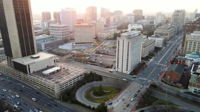 Downtown, Broad Street, and I-95 at Golden Hour in Richmond, Virginia (USA) | Aerial View Panning Up | Winter 2022