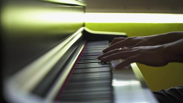 Pianist Playing Chopin Piece on Piano - Static Shot