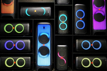 background of music speakers with colorful lights
