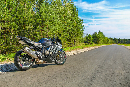 Stupino/Russia - AUGUST 29, 2019 motorbike bmw s1000rr on the road. black powerful motorcycle on a country road.